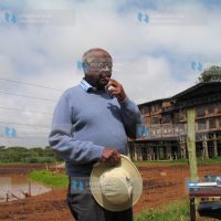 Former Attorney General Charles Njonjo in a pensive mood outside Treetops Hotel