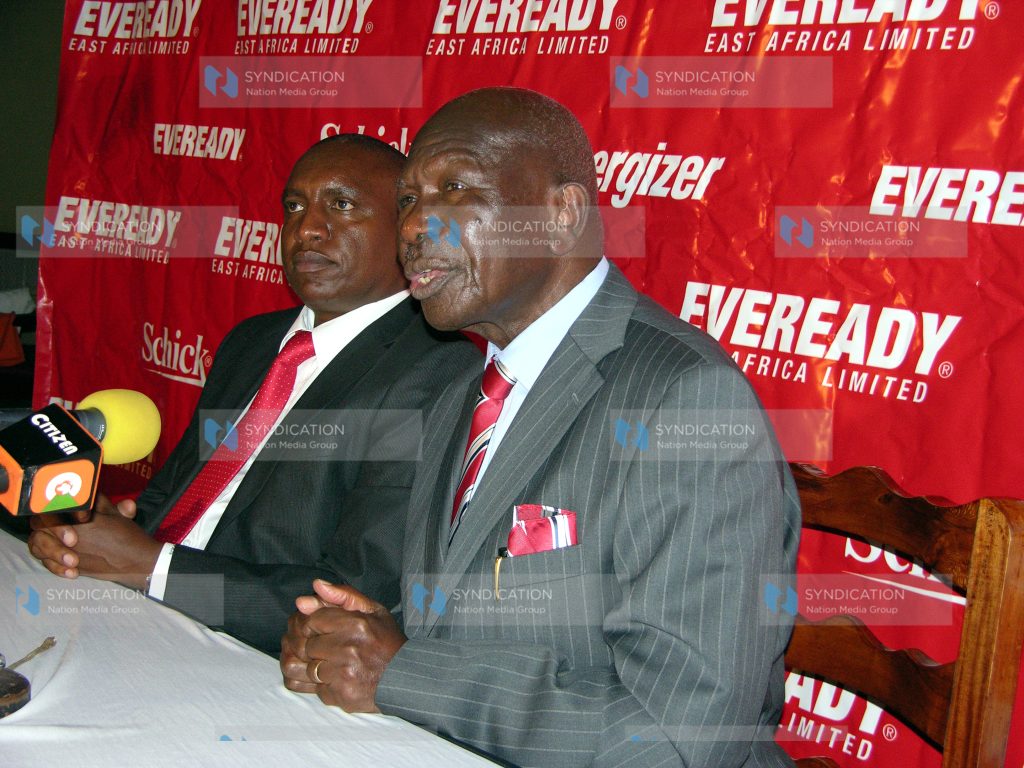 Eveready East Africa Ltd outgoing chairman Moody Awori and the company's MD Jackson Mutua