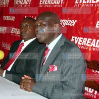 Eveready East Africa Ltd outgoing chairman Moody Awori and the company's MD Jackson Mutua