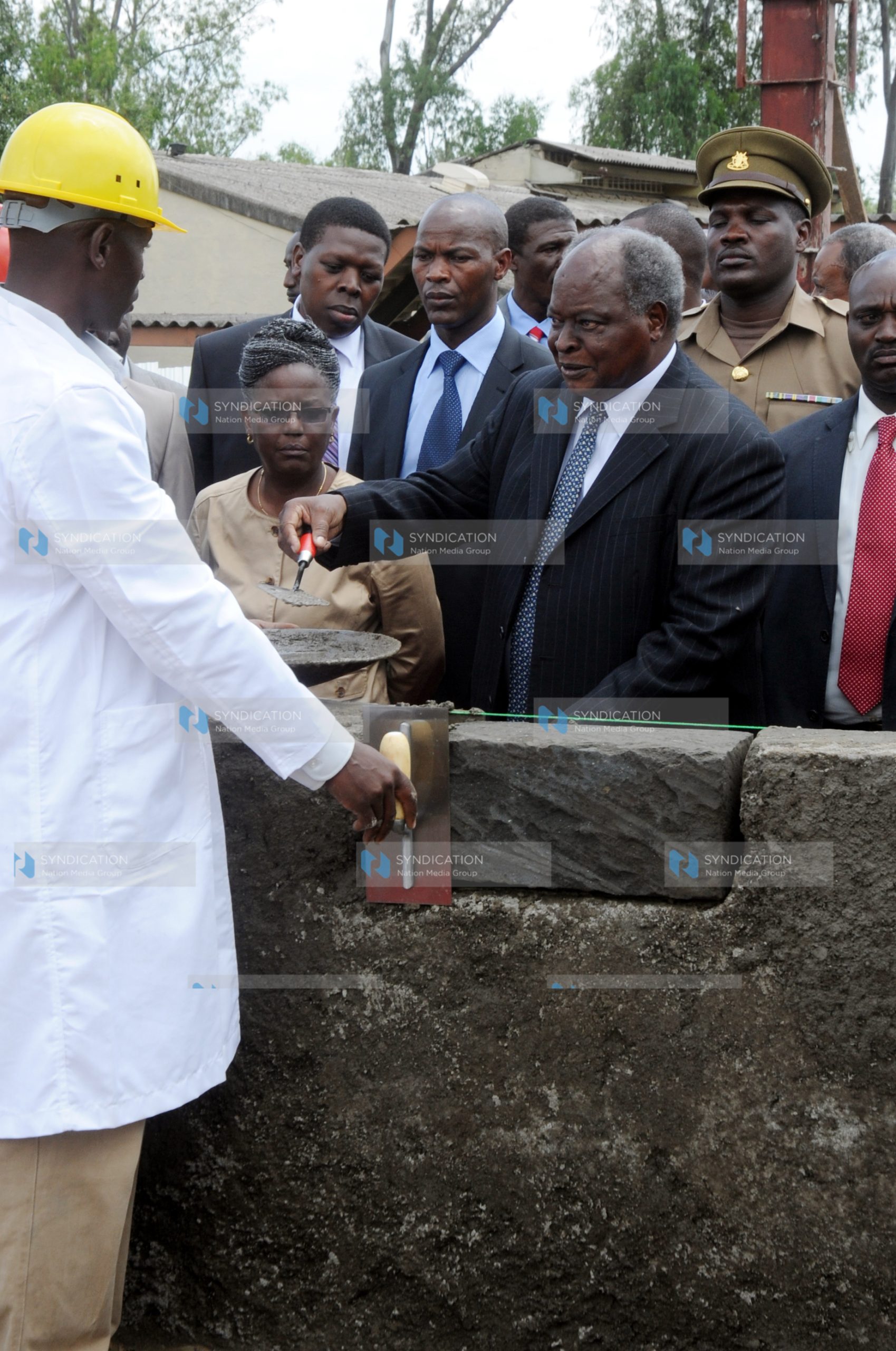 President Mwai Kibaki laying the foundation stone for the trauma center