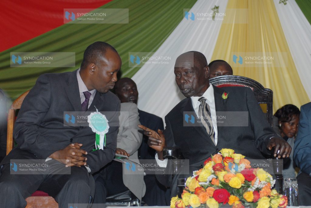 Former President Daniel Arap Moi chats with Nakuru Town MP Lee Kinyanjui