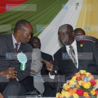 Former President Daniel Arap Moi chats with Nakuru Town MP Lee Kinyanjui