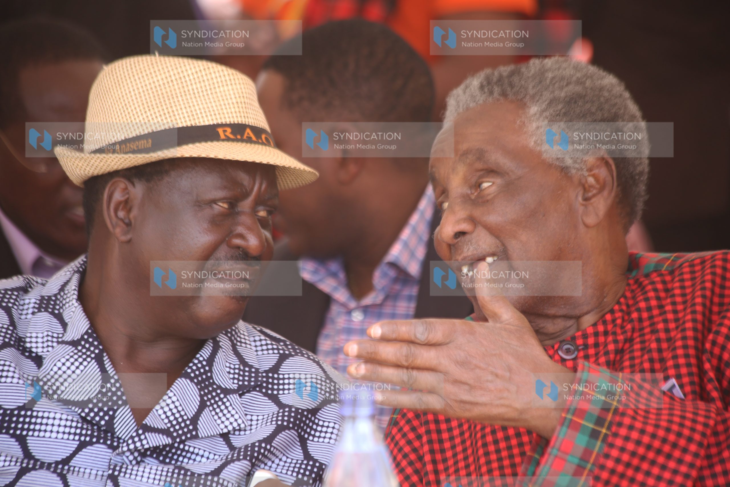 CORD leader Raila Odinga chats with former Cabinet Minister William Ole Ntimama