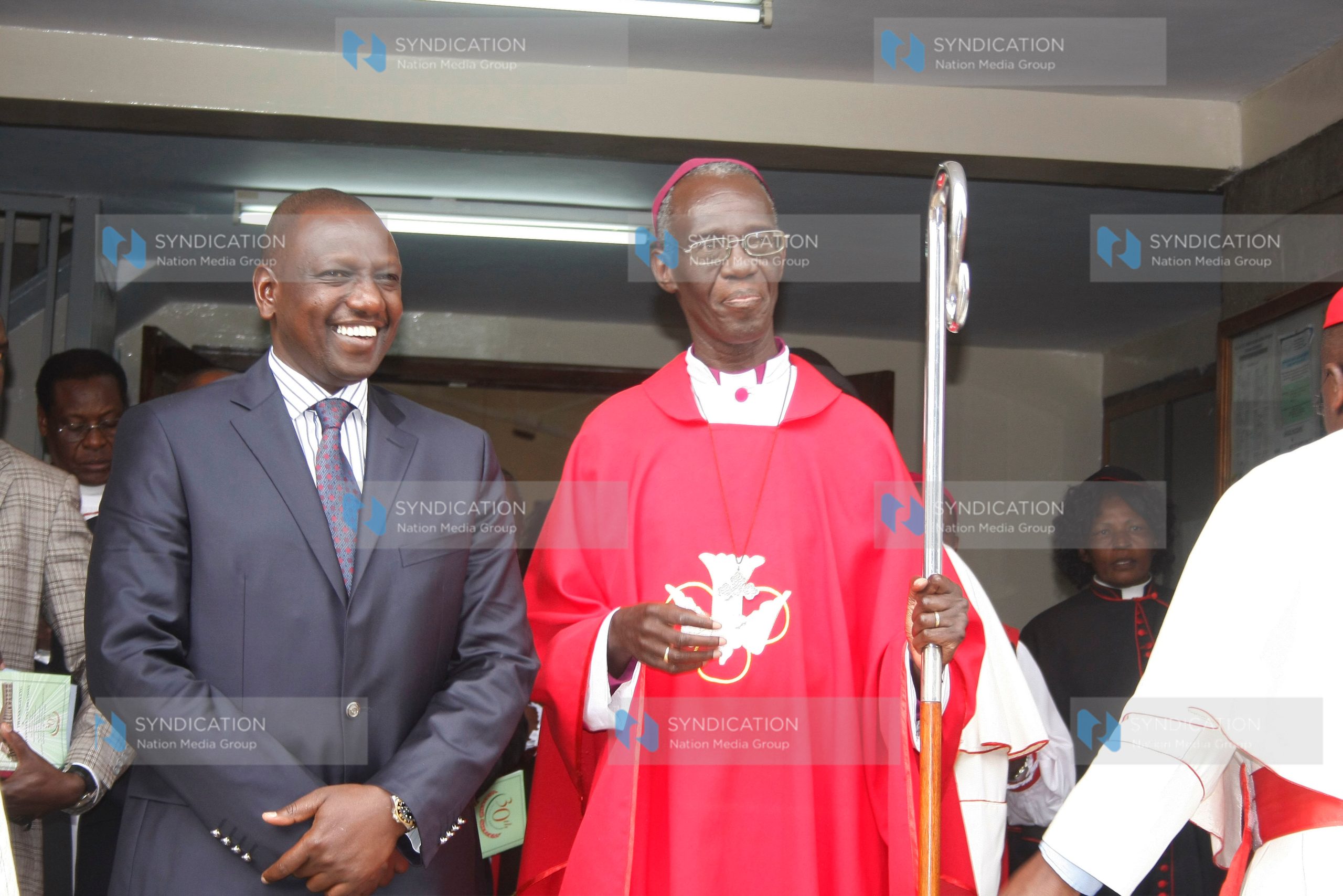 Deputy President William Ruto with Archbishop Eliud Wabukala