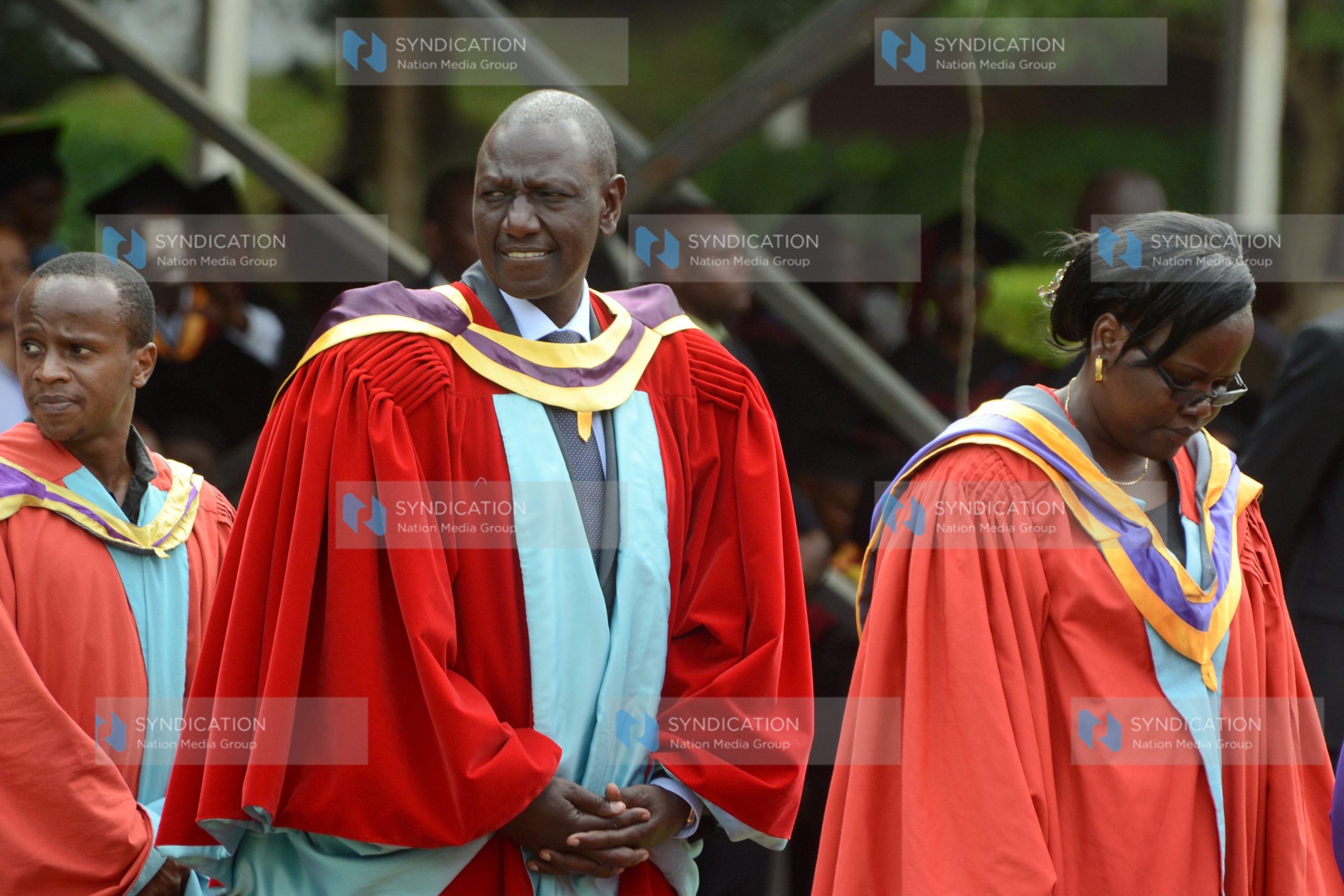 Deputy President William Ruto with fellow Graduands