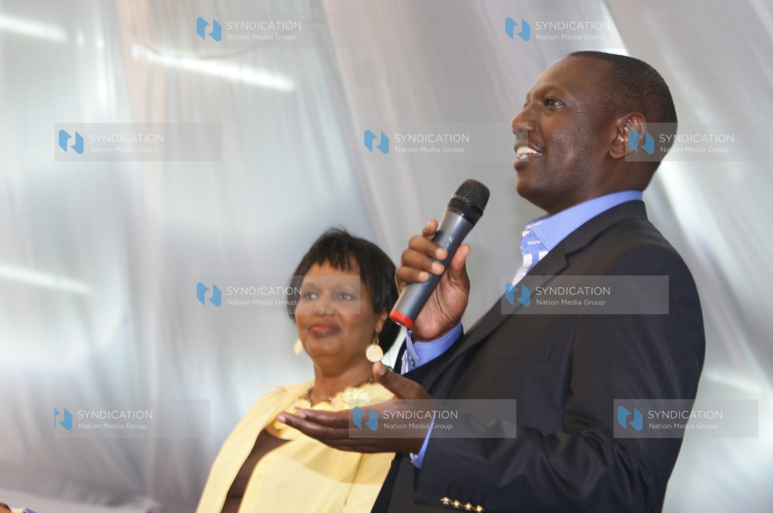 Eldoret MP William Ruto with Faith Evangelical Ministries Director Reverent Teresa Wairimu