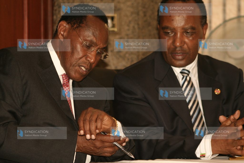 Minister for Internal Security Prof, George Saitoti sign performance contract