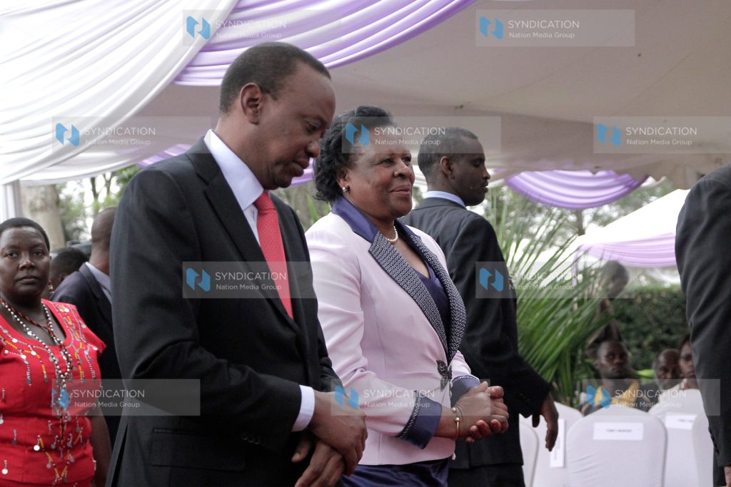President Uhuru Kenyatta and Margaret Saitoti, the widow of former Internal Security Minister Prof. George Saitoti