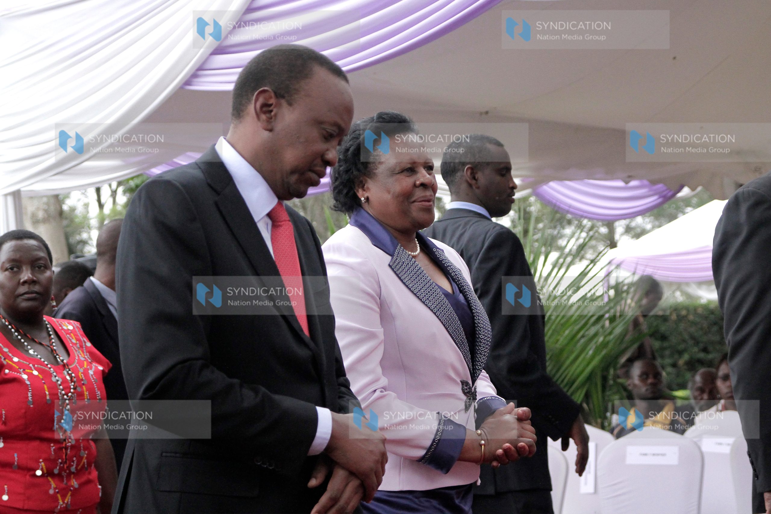 President Uhuru Kenyatta and Margaret Saitoti, the widow of former Internal Security Minister Prof. George Saitoti