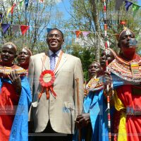 Internal security minister George Saitoti joins Samburu dancers