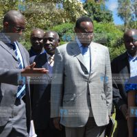 Internal Security Minister and MP for Kajiado North Hon. George Saitoti are shown the way by Mr. Stephen Ndoria
