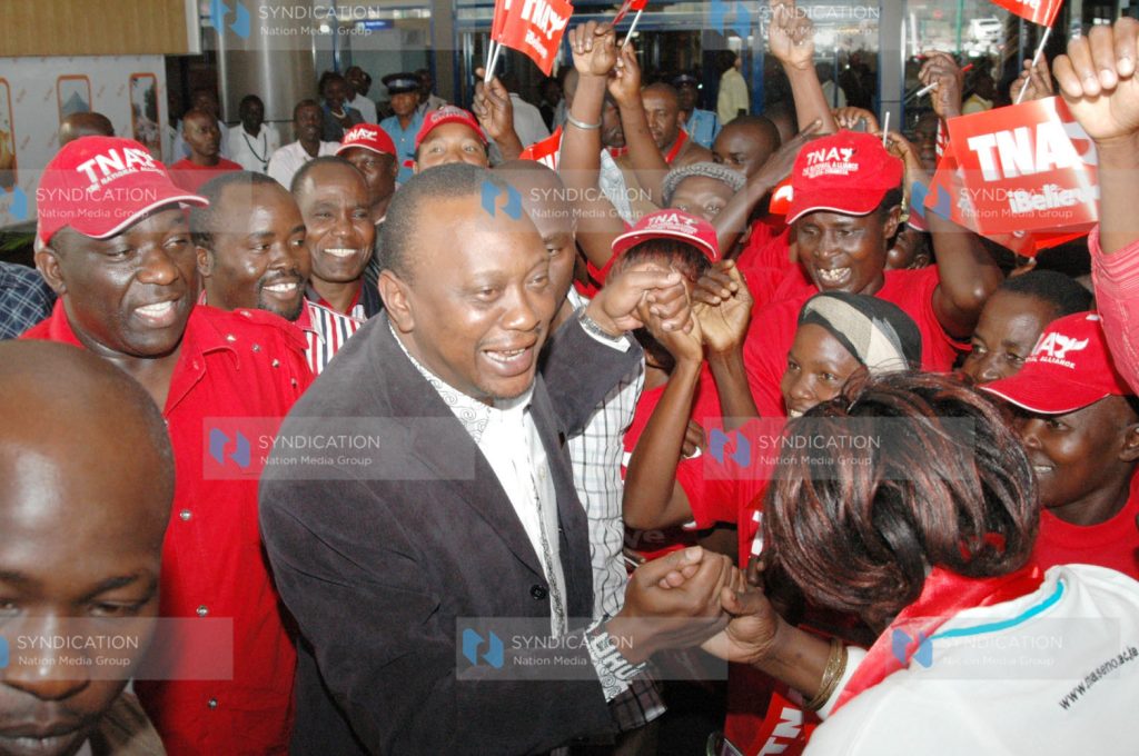 Deputy Prime Minister Uhuru Kenyatta (centre)