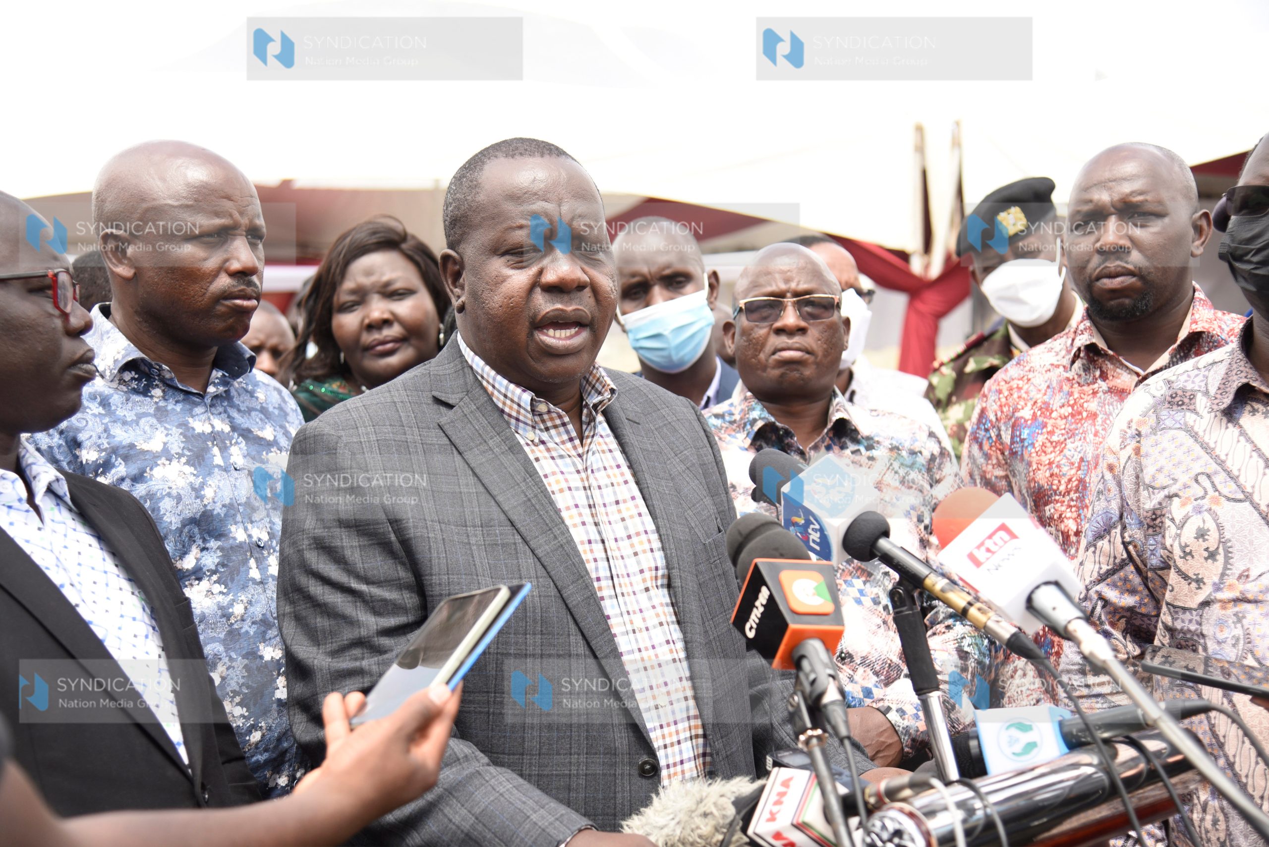 Interior CS, Fred Matiang’i flanked by political leaders