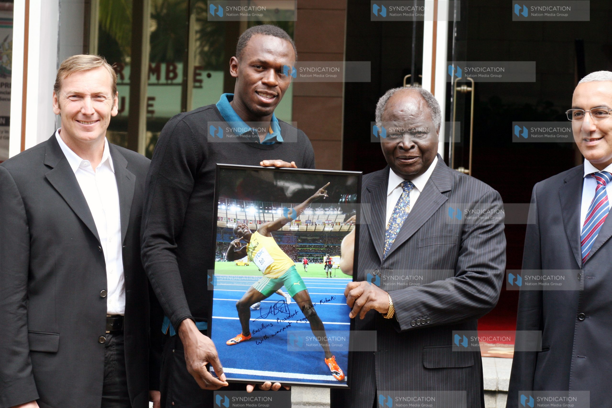 President Mwai Kibaki receives a gift