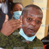 Amos Kimunya addressing the media in Parliament buildings