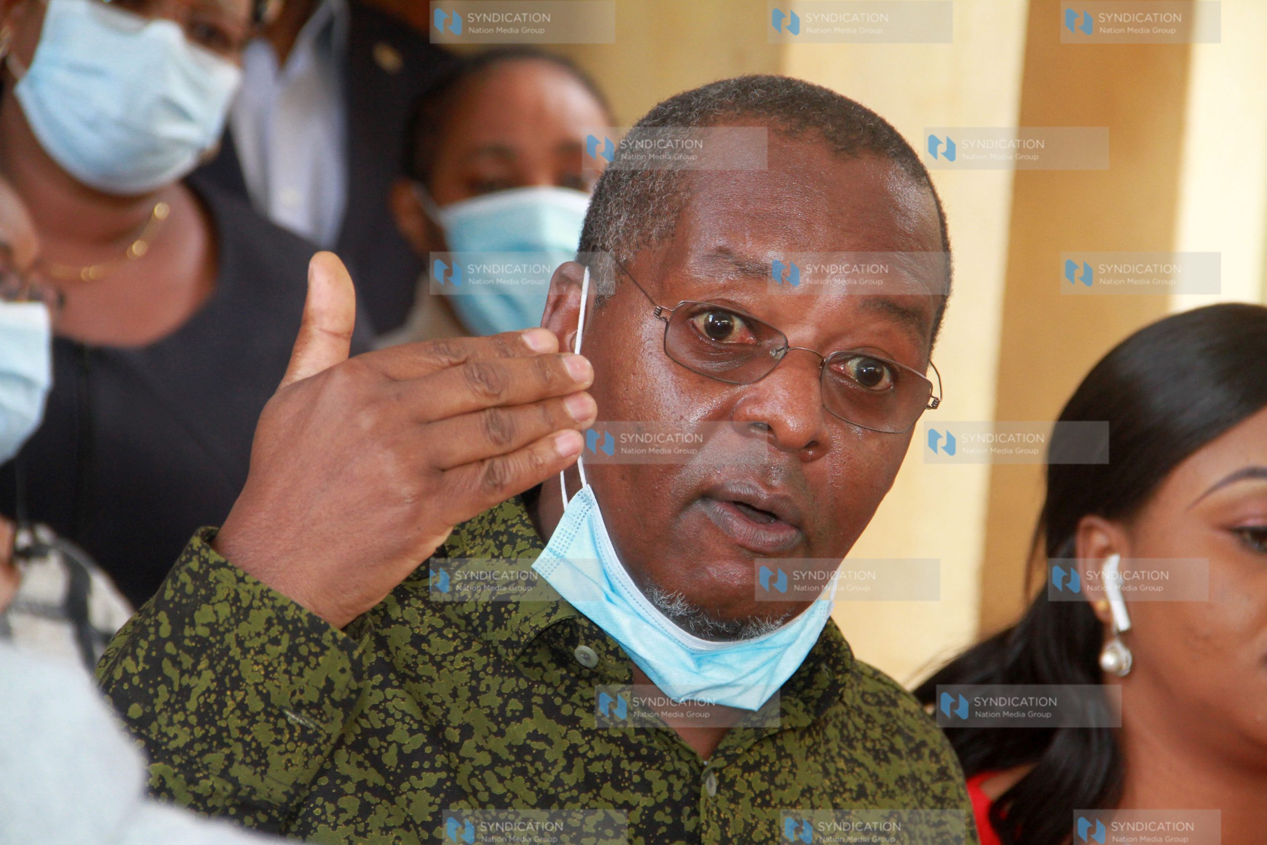 Amos Kimunya addressing the media in Parliament buildings