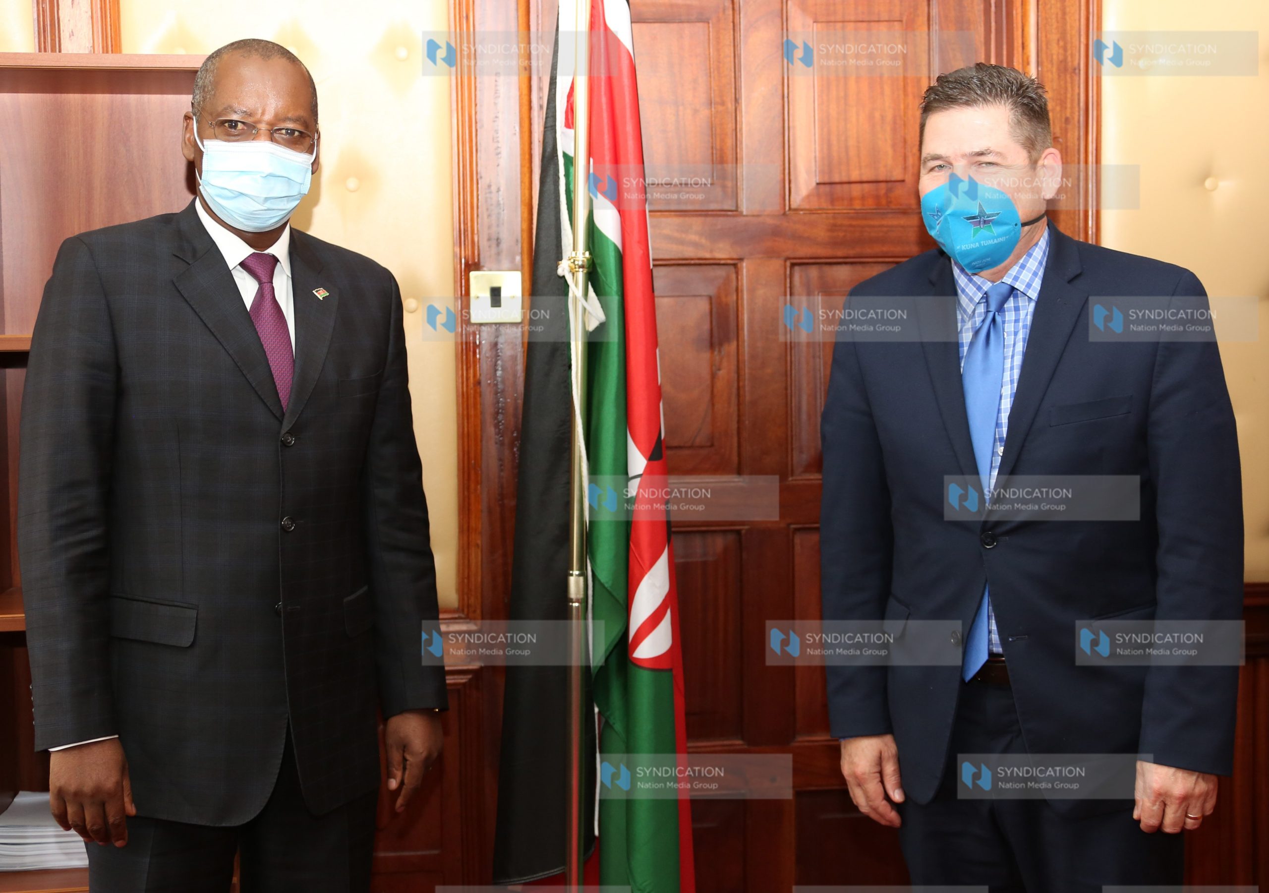 Majority leader Amos Kimunya with US ambassador to Kenya Kyle McCarter