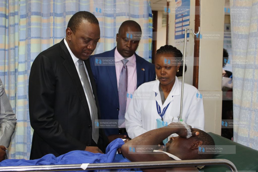 President Uhuru Kenyatta with Kieni MP Kanini Kega