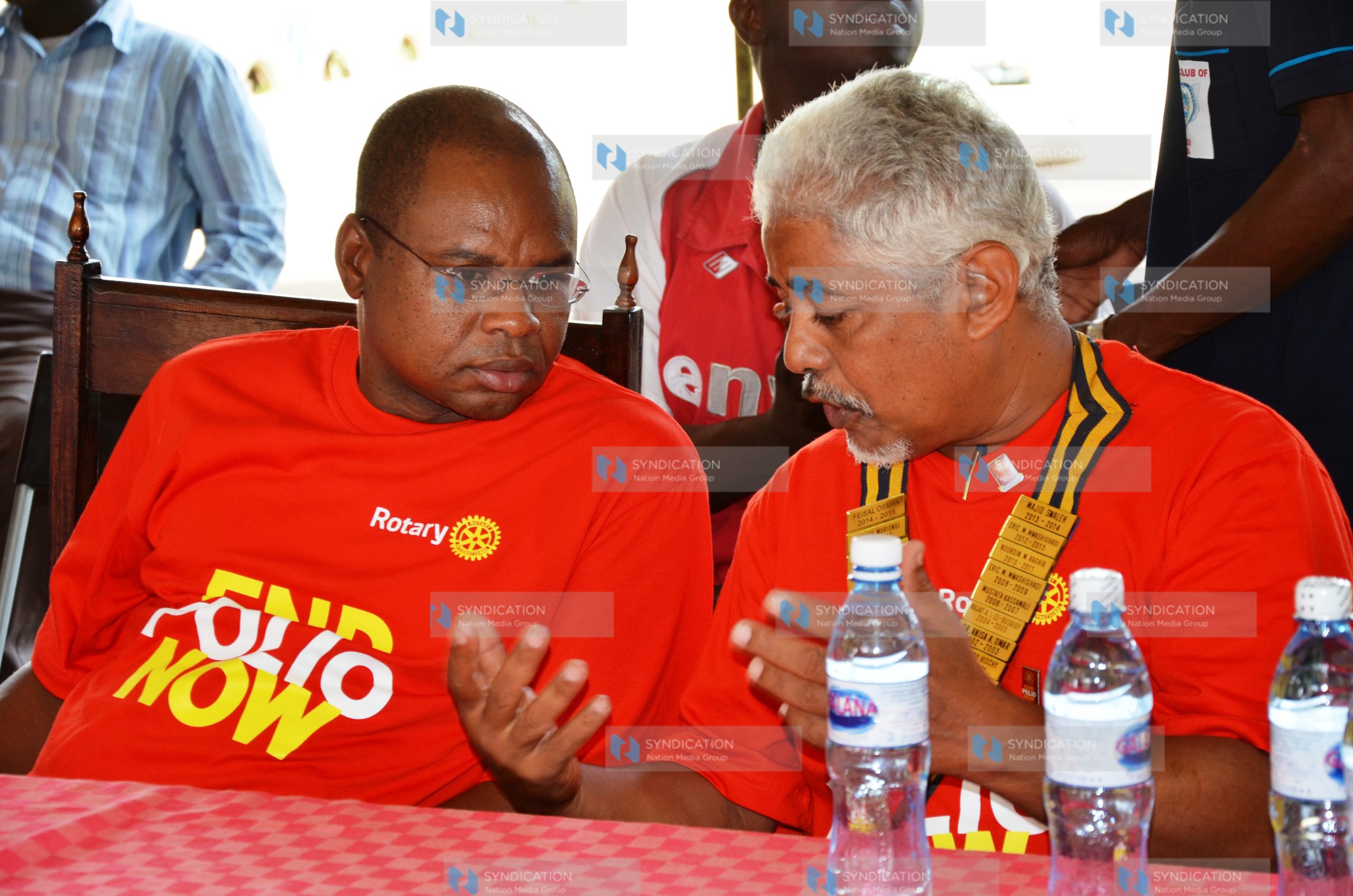 Amason Kingi shares a word with the president Malindi rotary club Mr. Feswal Osman