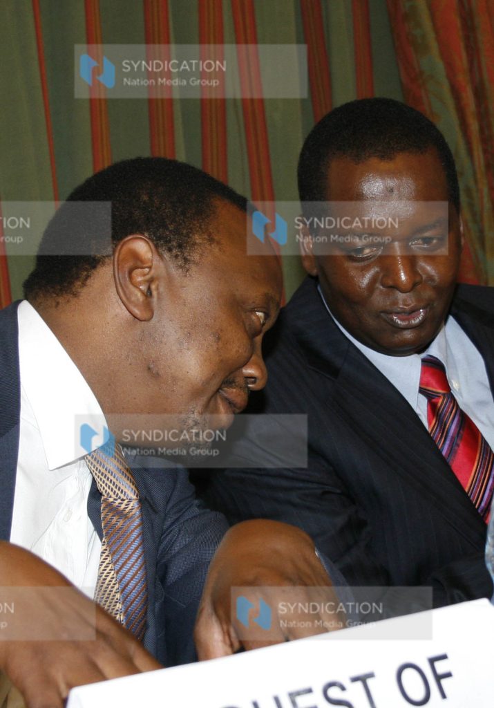 Trade Minister Amos Kimunya and the Finance Minister Uhuru Kenyatta
