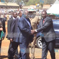 President Mwai Kibaki is welcomed by suspended Higher Education Minister William Ruto