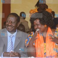 CORD leader Raila Odinga, alongside ODM Uasin Gishu County chairlady Magdalen Sirtui