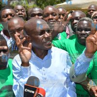 Senator of Kakamega Boni Khalwale interacts with former UDF supporters