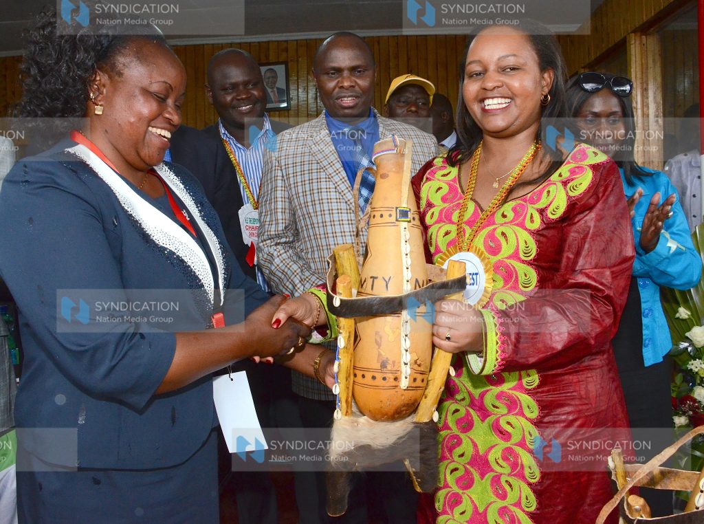 Devolution and Planning Cabinet Secretary Anne Waiguru is presented with a gift