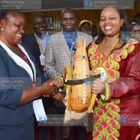 Devolution and Planning Cabinet Secretary Anne Waiguru is presented with a gift