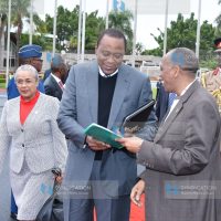 President Uhuru Kenyatta is briefed by the head of civil service Joseph Kinyua