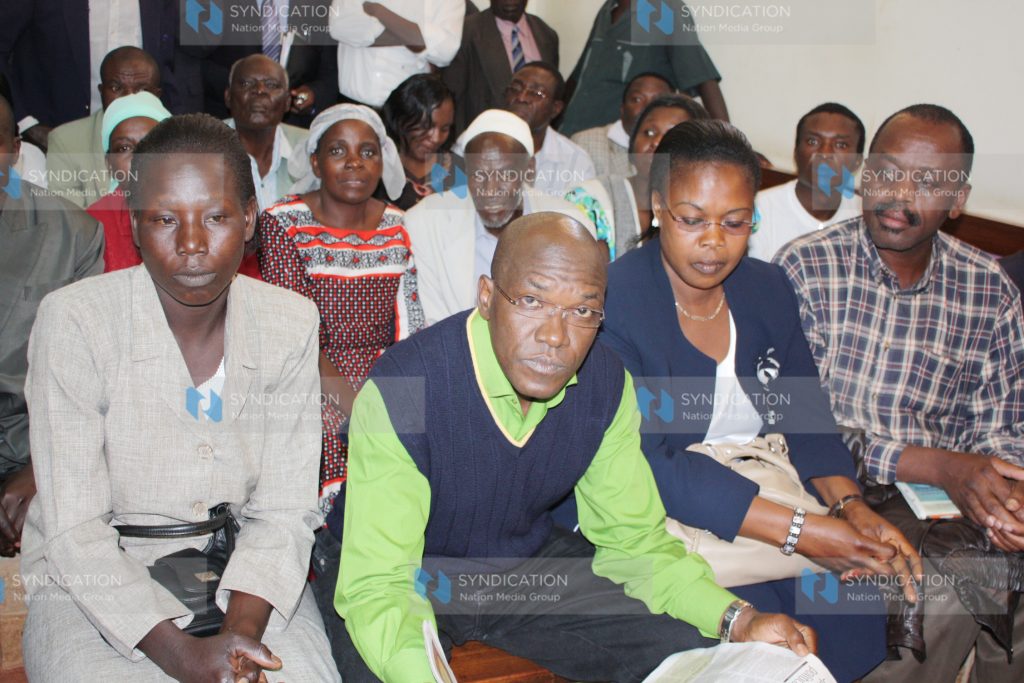 Ikolomani MP Dr. Boni Khalwale between his two wives Adelide Shikanga Khalwale and Josephine Nafula Khalwale