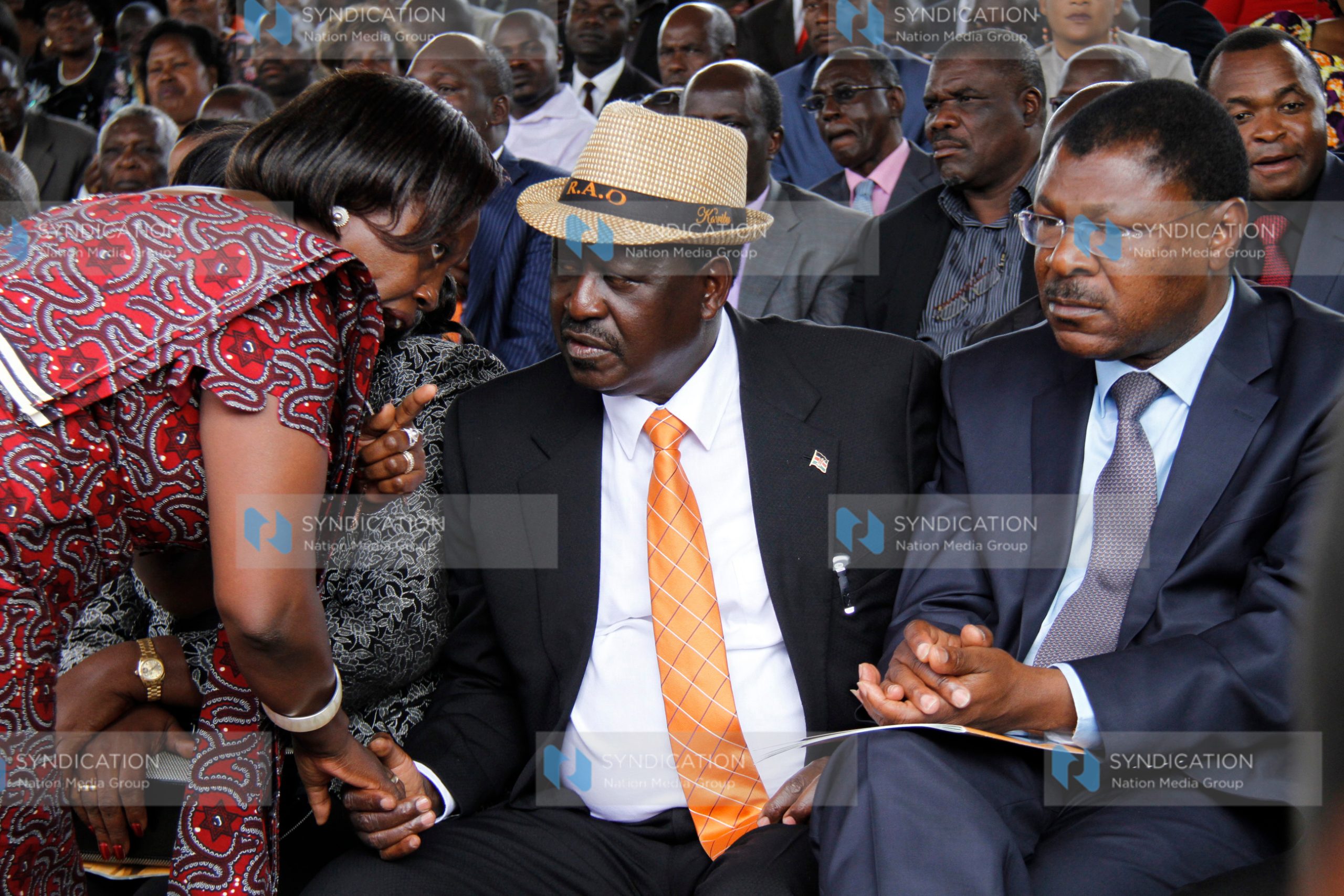 NARC–Kenya leader Martha Karua speaks with former Prime Minister Raila Odinga and CORD principal Moses Wetangula