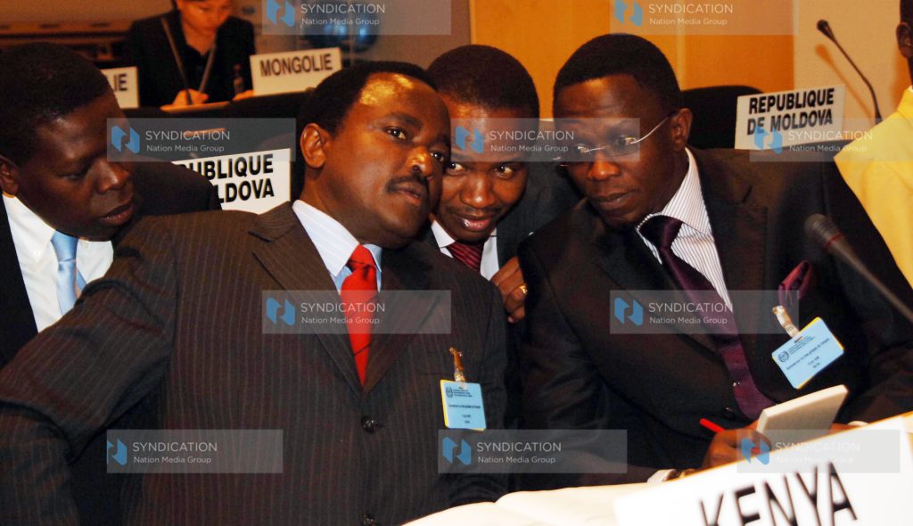 Kalonzo Musyoka consults with the Members of Parliament