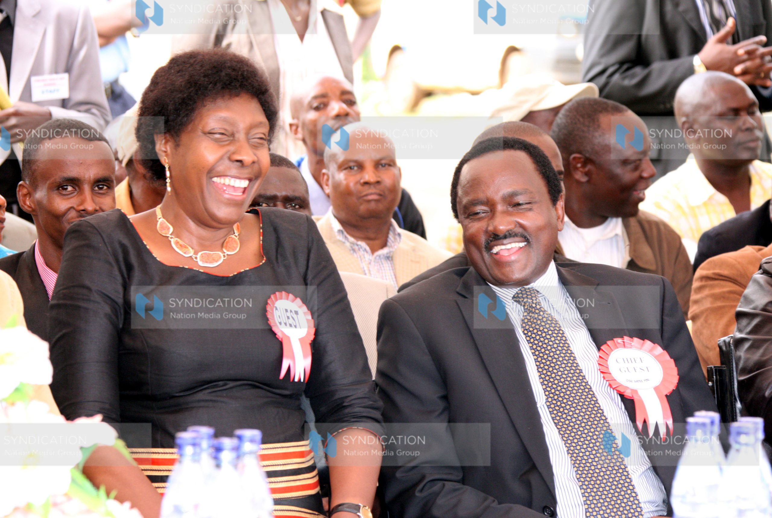 Kalonzo Musyoka shares a light-hearted moment with water and Irrigation Minister Charity Ngilu