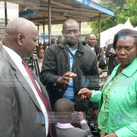 Presidential aspirant Martha Karua(right) chats with her supporters