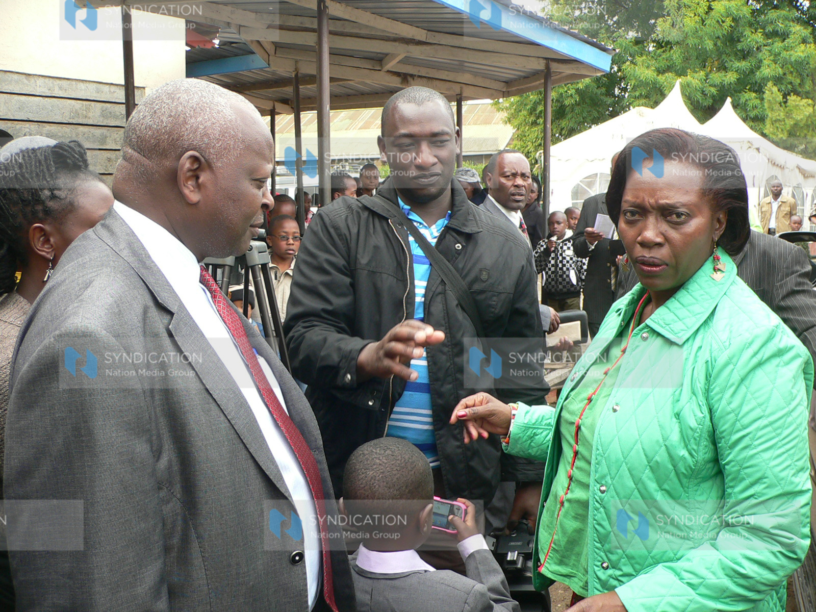 Presidential aspirant Martha Karua(right) chats with her supporters