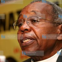 Reverend Timothy Njoya addressing a news conference