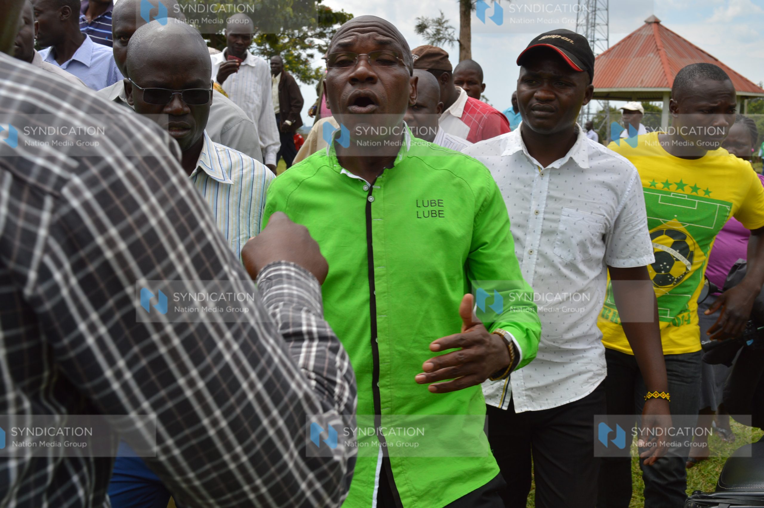 Boni Khalwale is congratulated by residents of Kakamega
