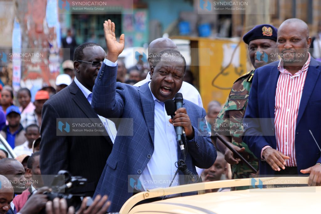 Cabinet Secretary Fred Matiang'i [C] addressing residents of Gatundu town