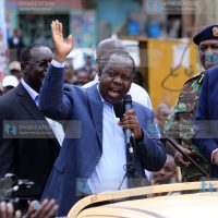 Cabinet Secretary Fred Matiang'i [C] addressing residents of Gatundu town