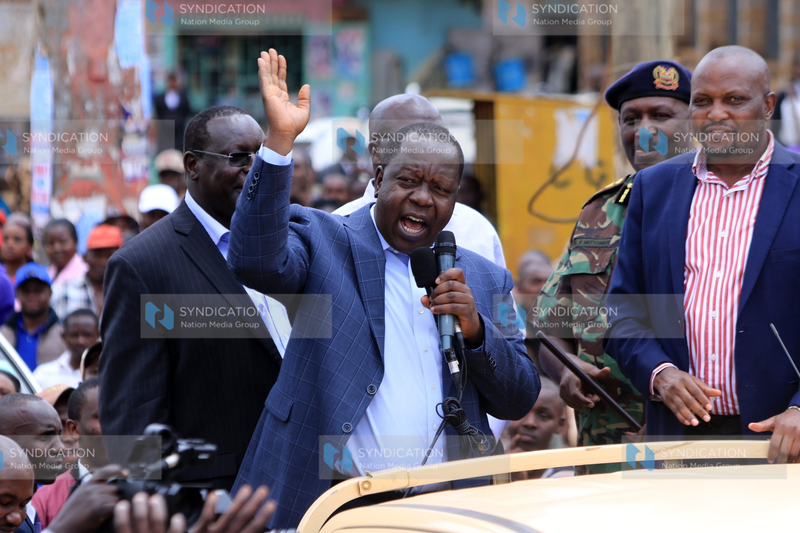 Cabinet Secretary Fred Matiang’i [C] addressing residents of Gatundu town