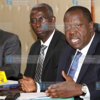 Education Cabinet Secretary Fred Matiang'i (right)