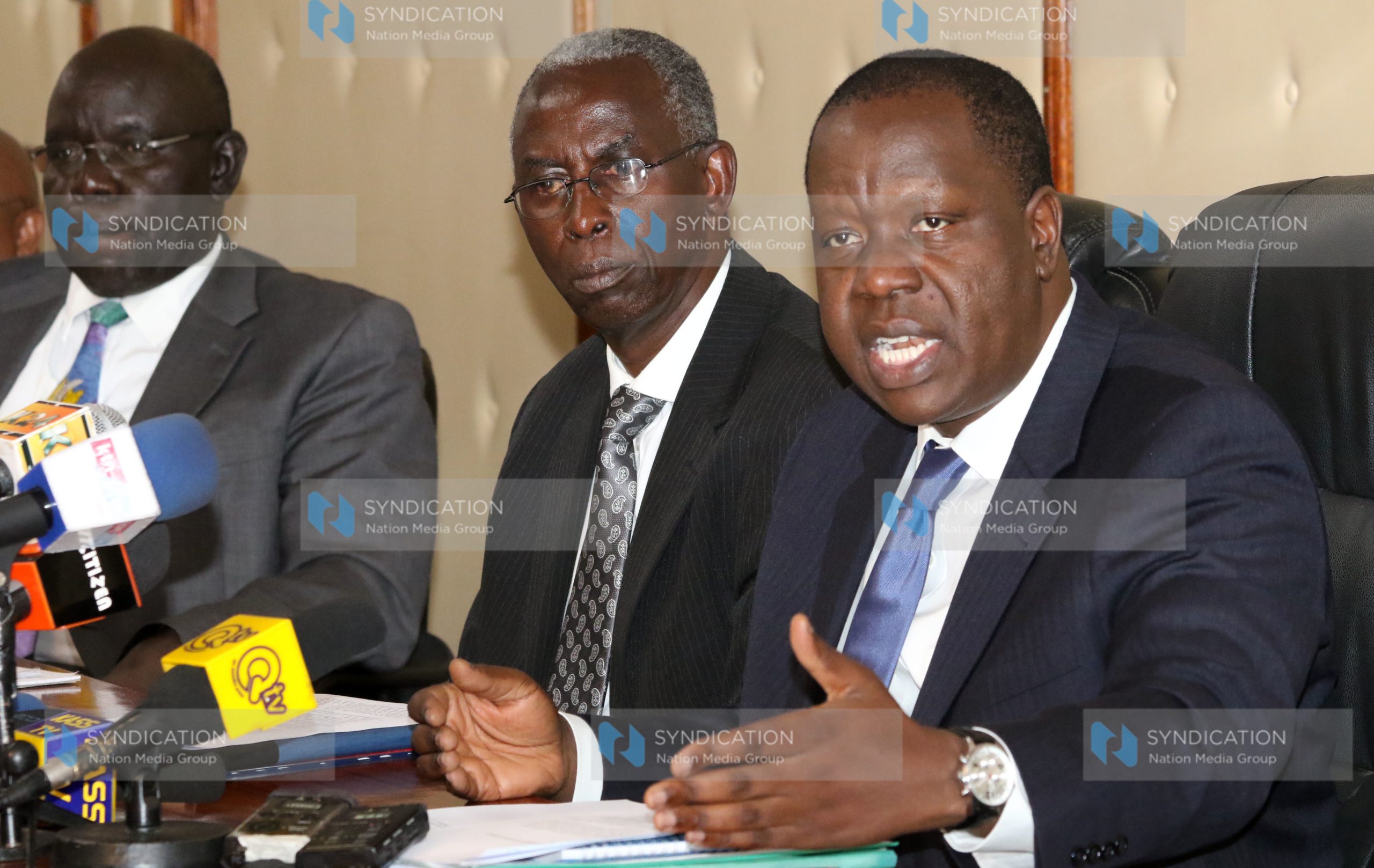 Education Cabinet Secretary Fred Matiang’i (right)