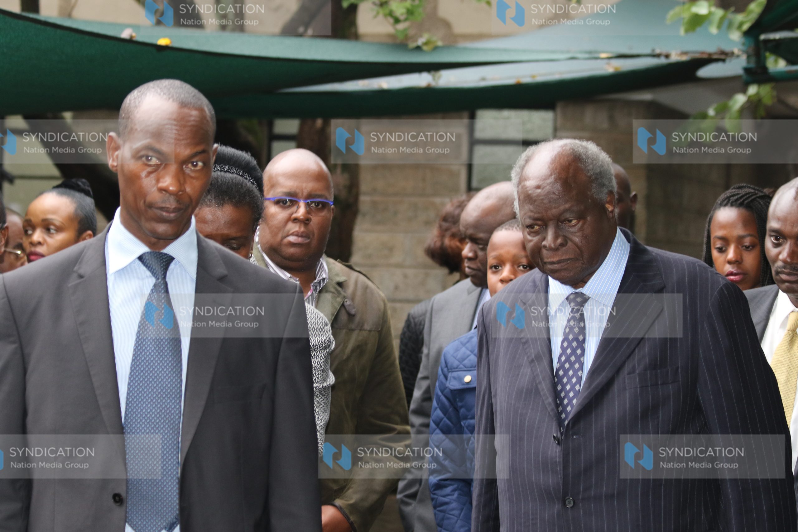 Former President Mwai Kibaki (Right) leave Lee Funeral Home