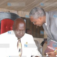 Former President Daniel arap Moi chats with Special Programme Permanent Secretary Ali Mohammed