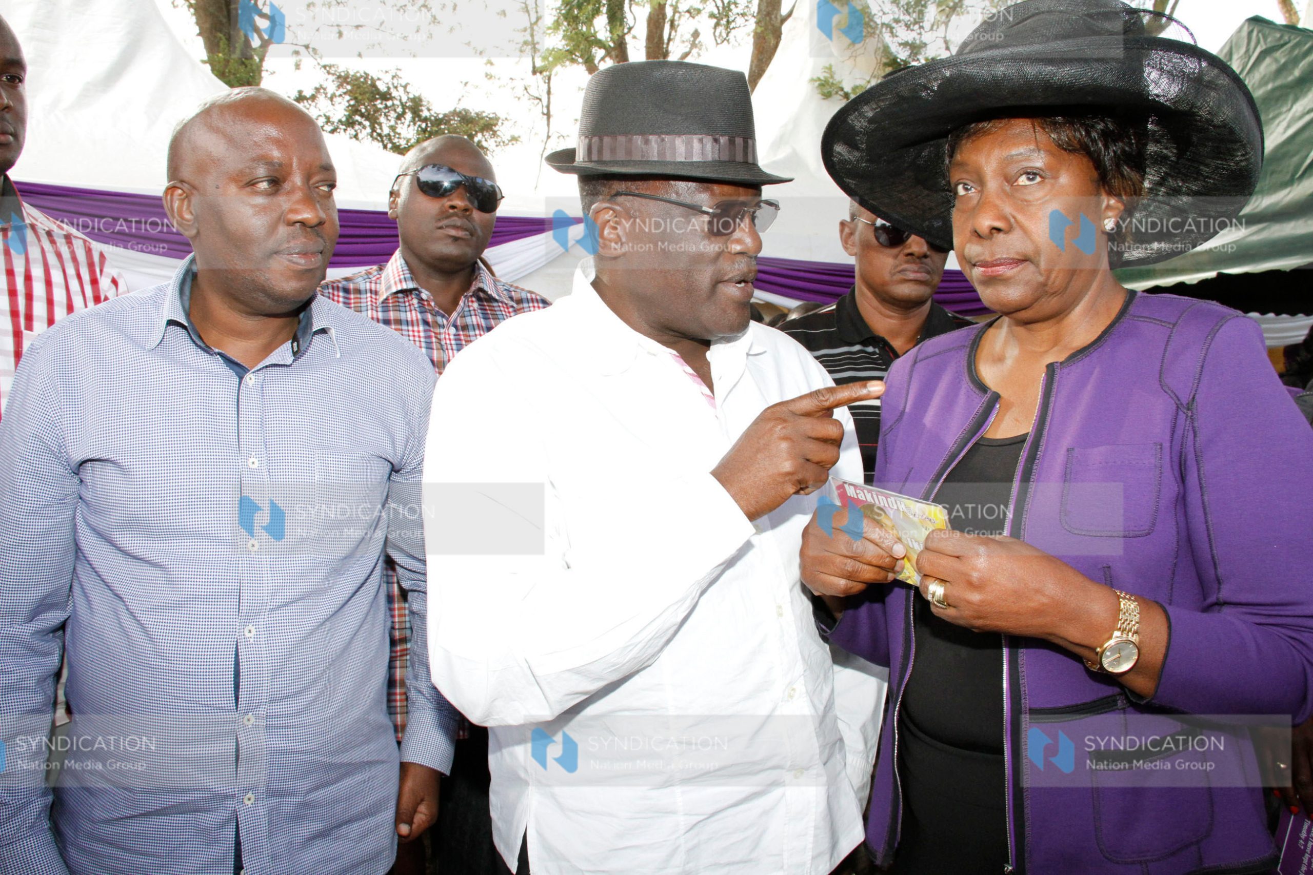 Machakos Senator Johnston Muthama (center)