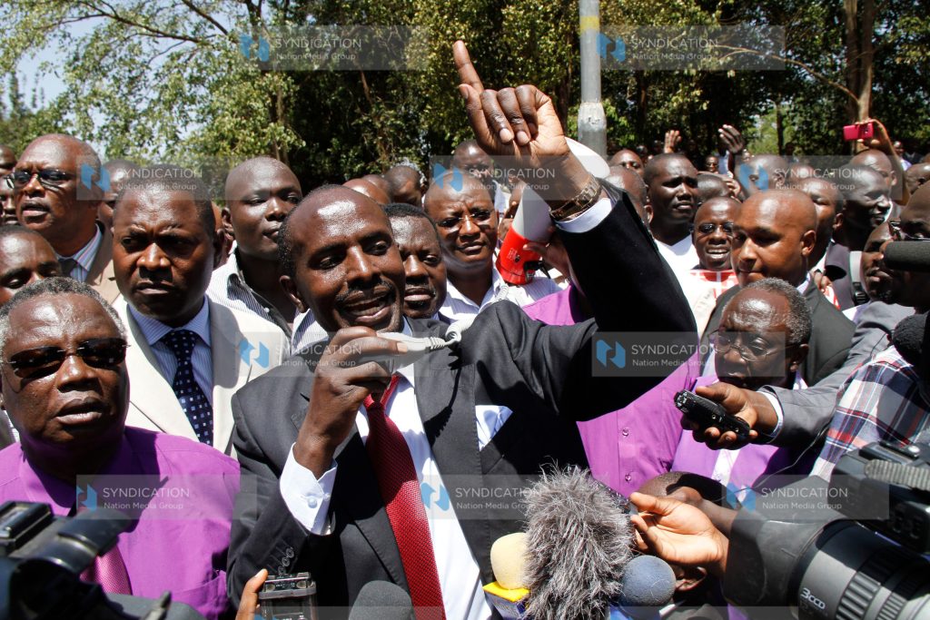 Wilson Sossion (center) address Teachers from Mandera outside CID headquarters