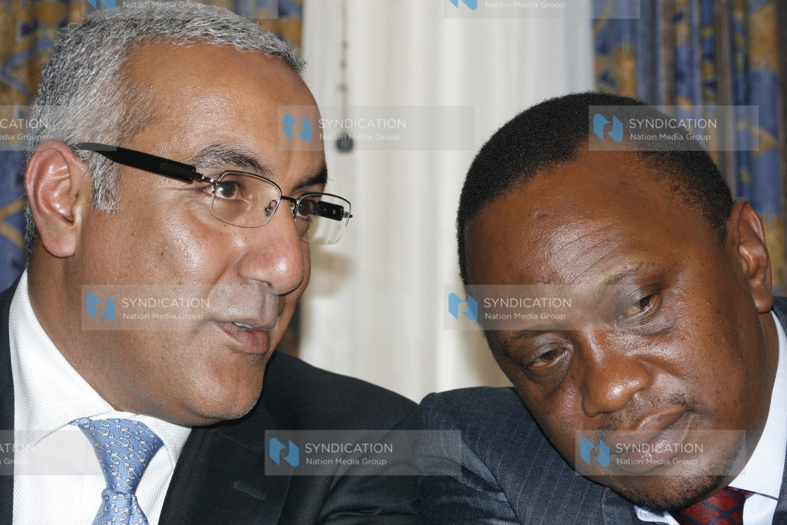 Najib Balala confers with Deputy Prime Minister and Minister for Finance Uhuru Kenyatta (right)