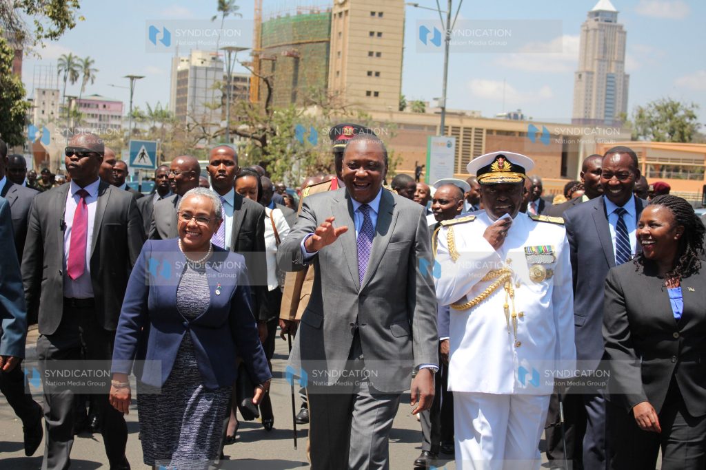 President Uhuru Kenyatta together with First Lady Margaret Kenyatta (left) and Chief of General Staff Samson Mwathethe