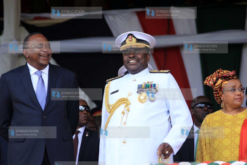 President Uhuru Kenyatta having a word with Chief of Defence Forces Samson Mwathethe